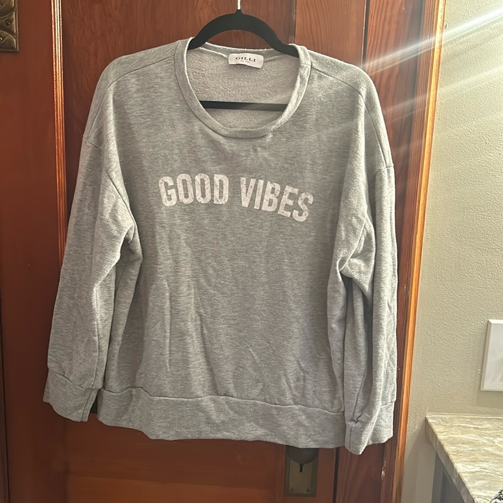 Plus size sweatshirt.  Good Vibes on front.